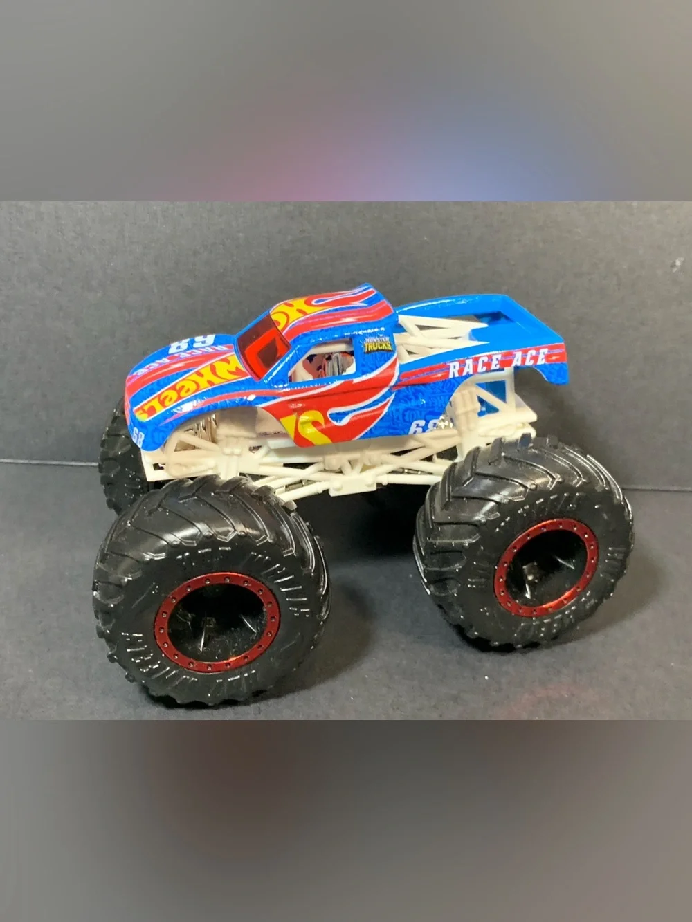 Lot of 4 Monster JAM Trucks – Hot Wheels, Horse Power, Tiger Shark